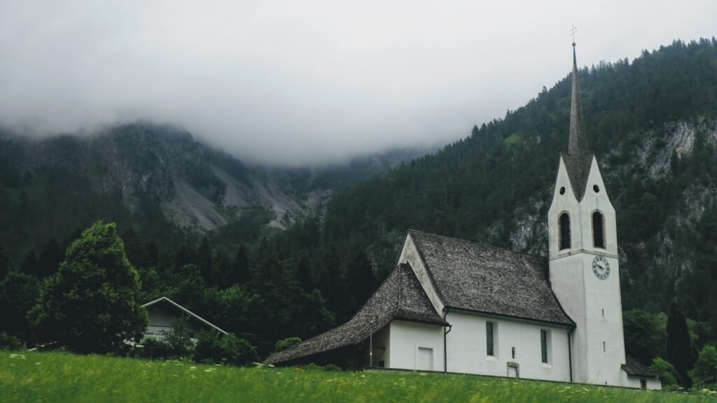 white and brown concrete church
